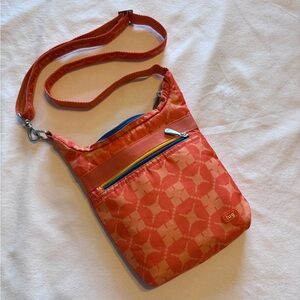 Lug Kids Waddle Cross-Body Pouch
Orange Pattern Lightweight
Adjustable Strap